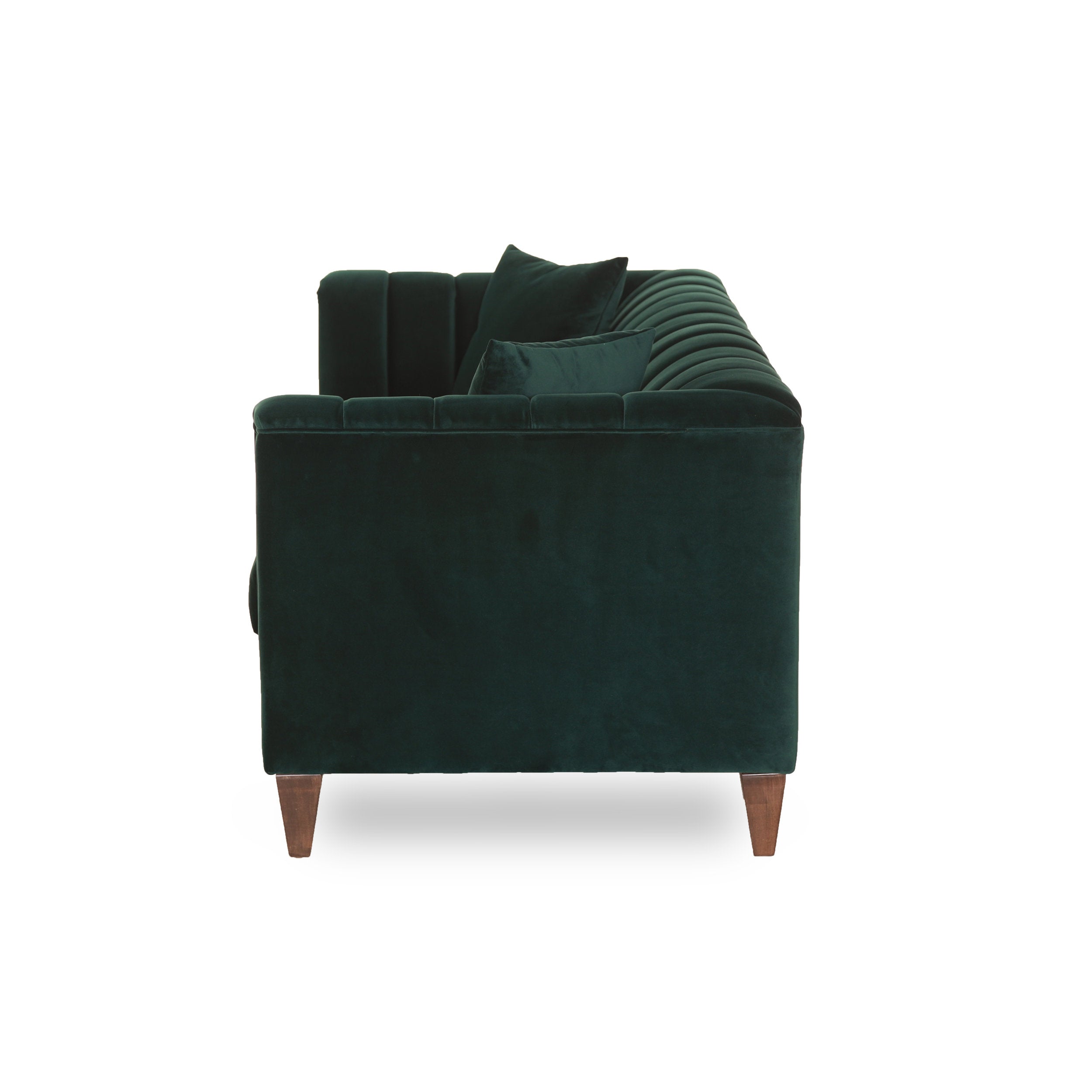 Green velvet sofa on a white background