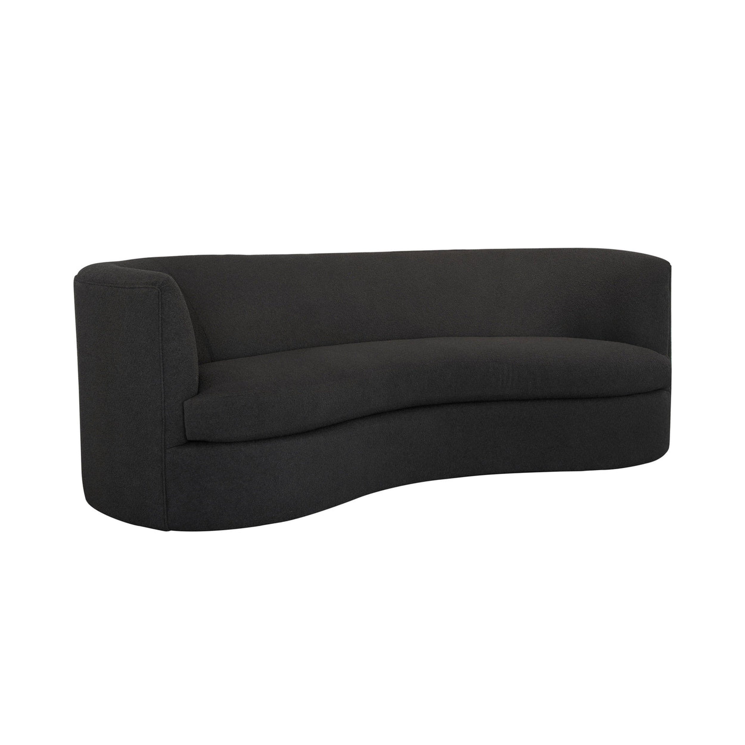Black curved sofa on a white background