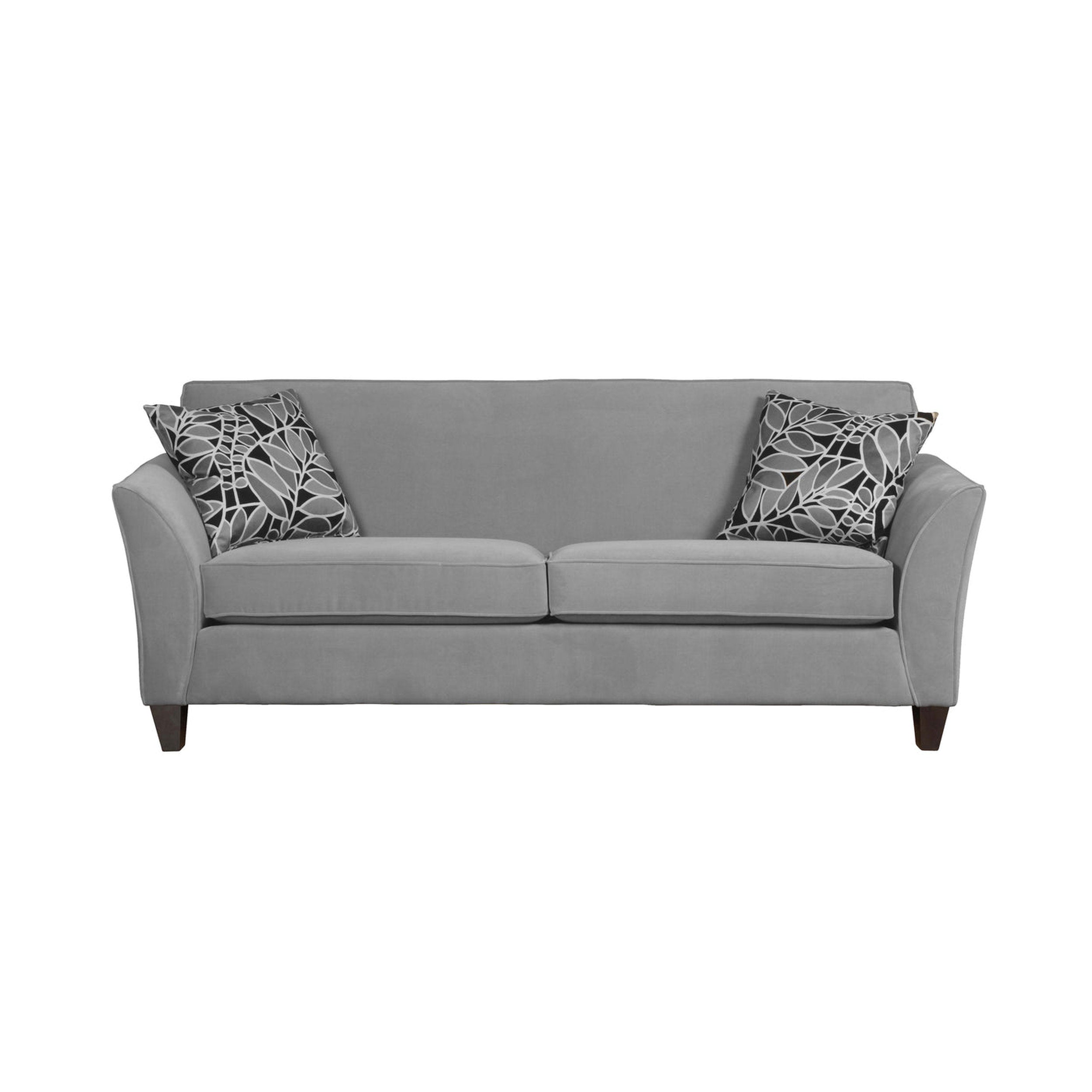 Gray sofa with decorative pillows on a white background