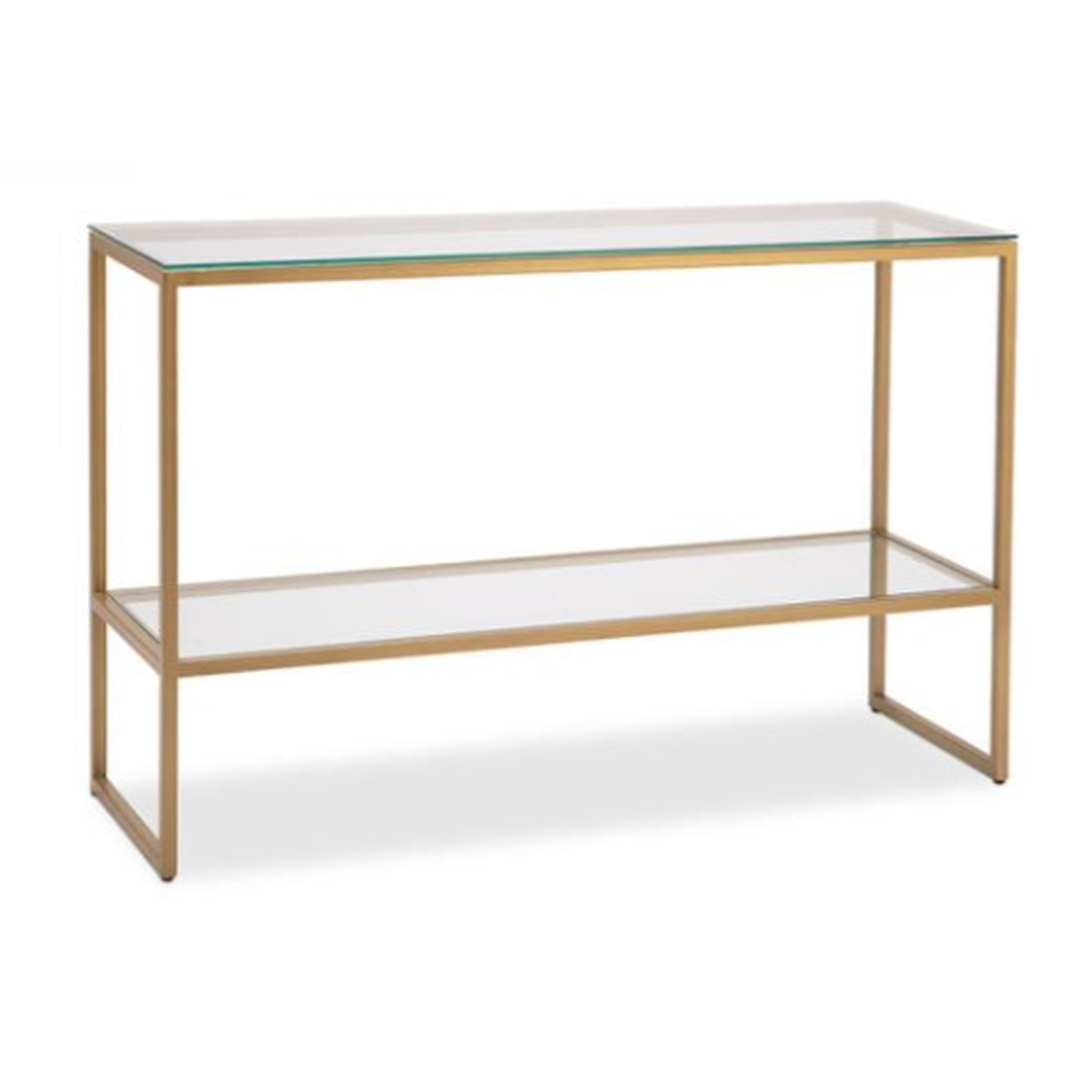 Console table with glass top and gold metal frame on a white background