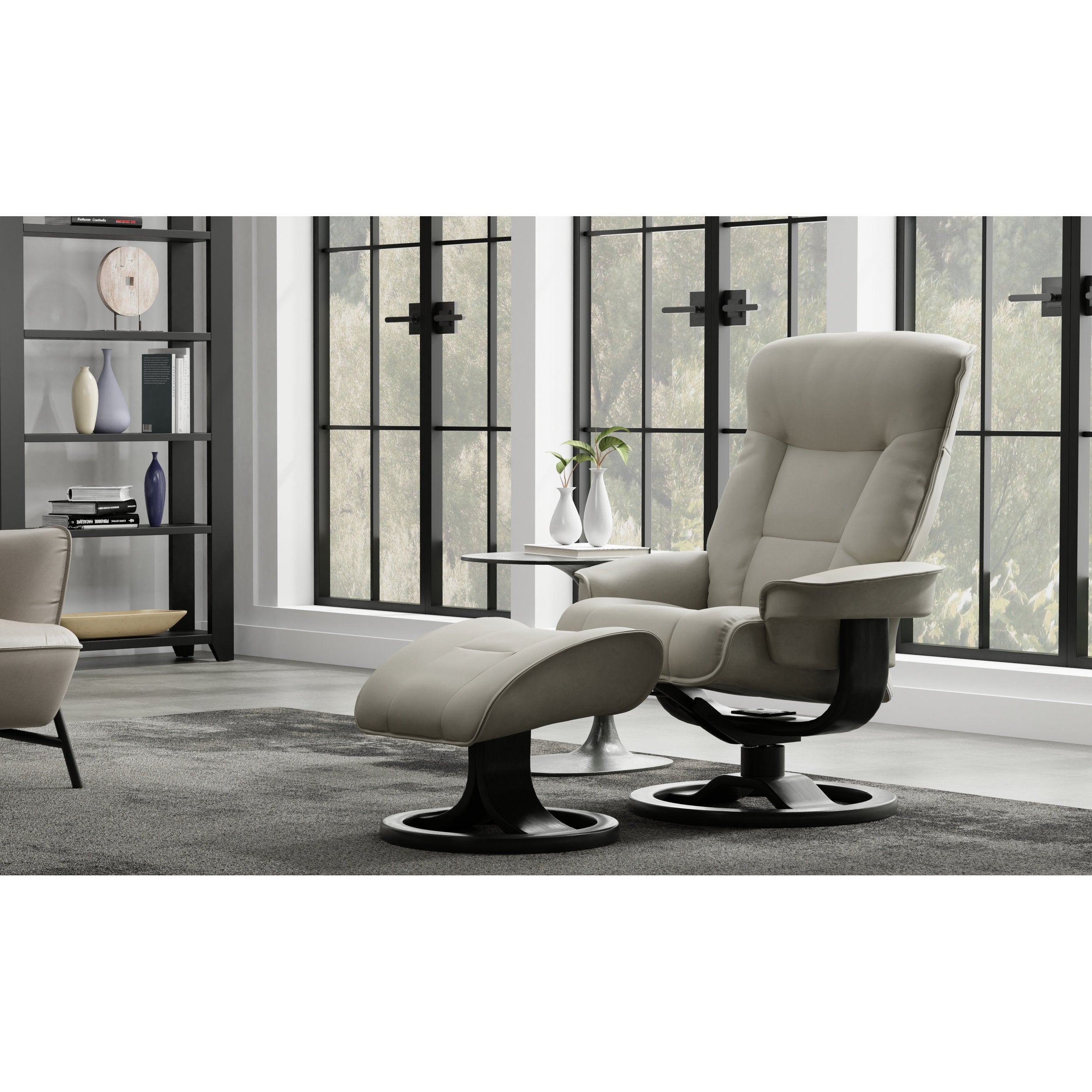 Beige recliner chair with ottoman in a modern room with large windows.