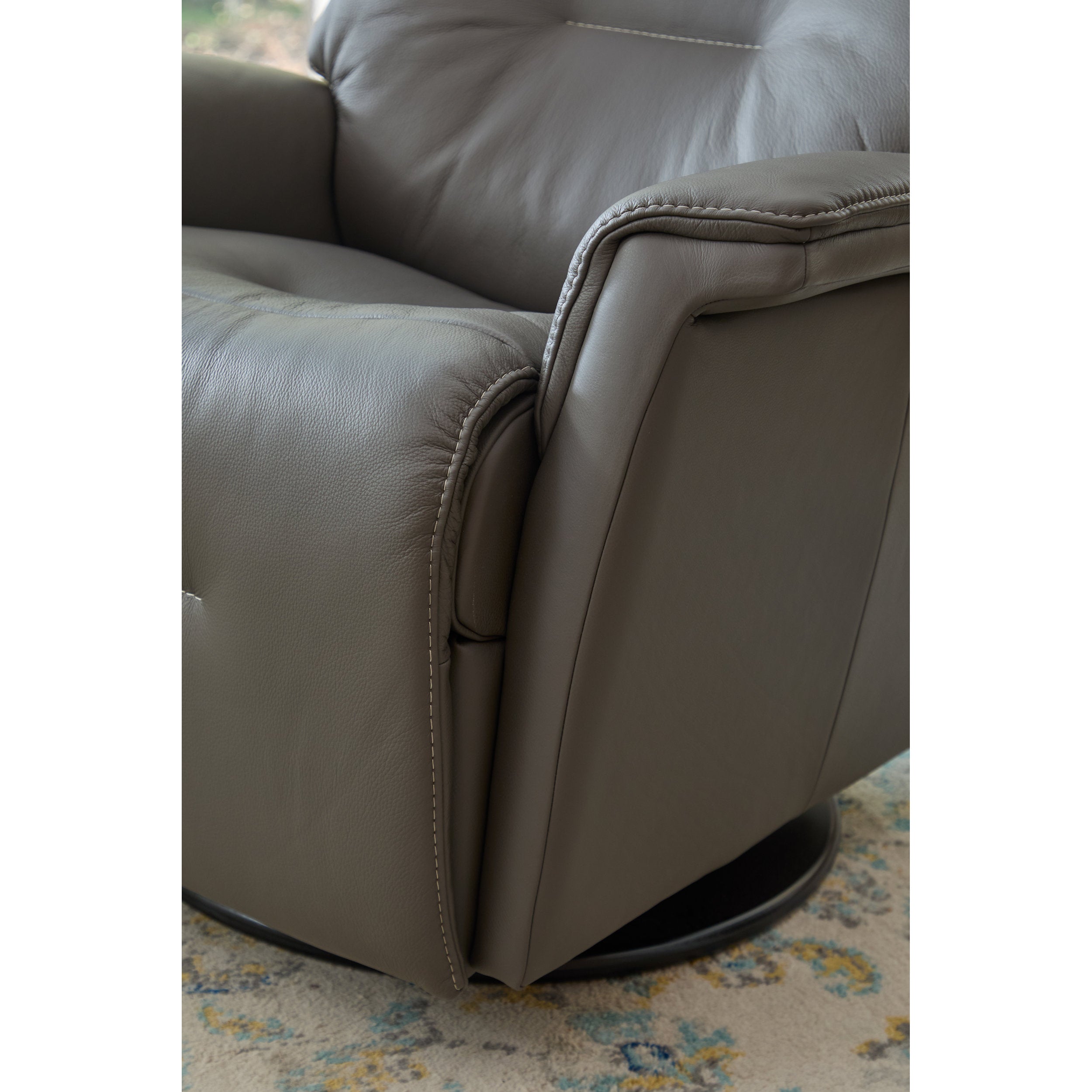 Rome Recliner by Fjords in gray leather with stitching, padded arms, and panel sides on a dark base, matte finish satin now