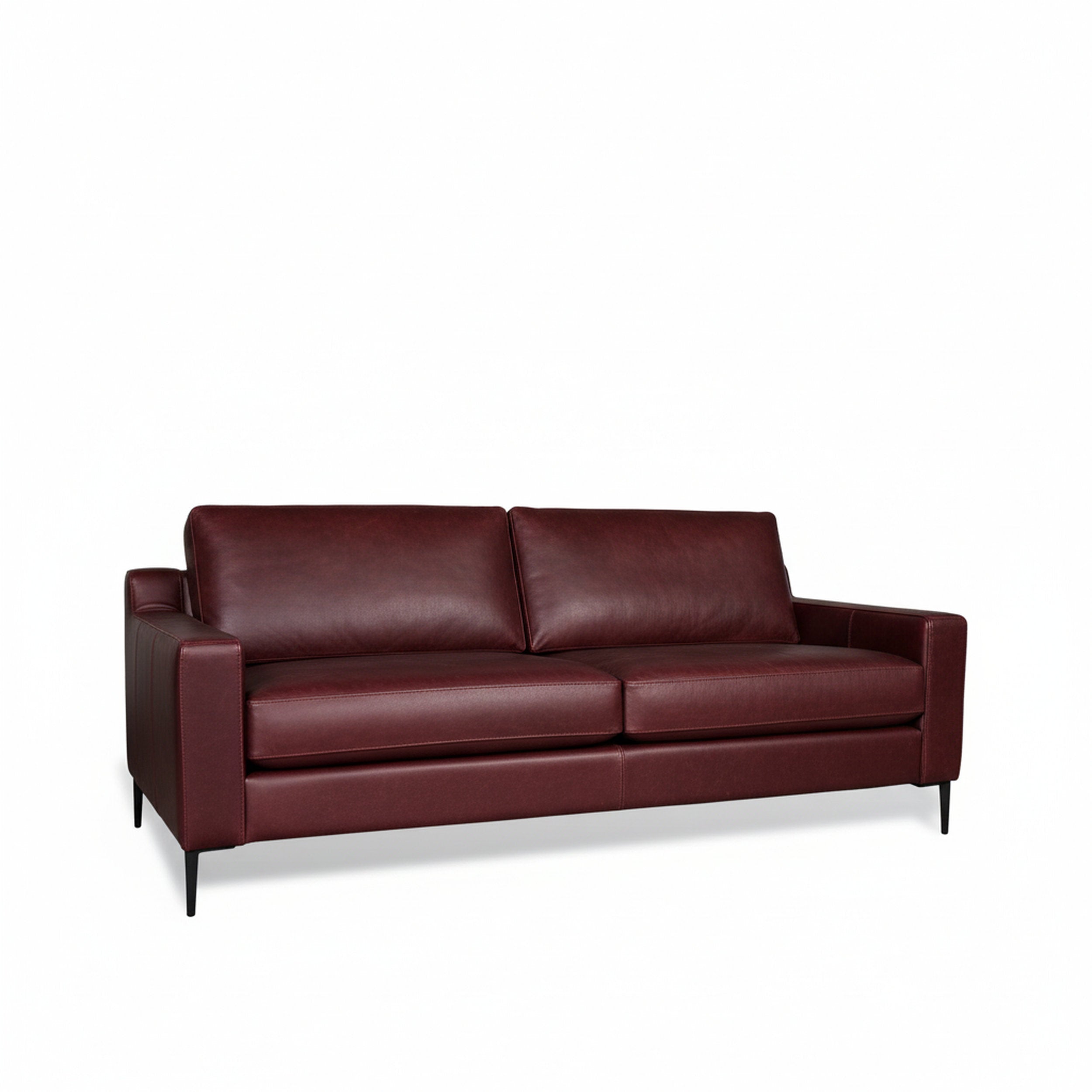 red leather sofa on a white background