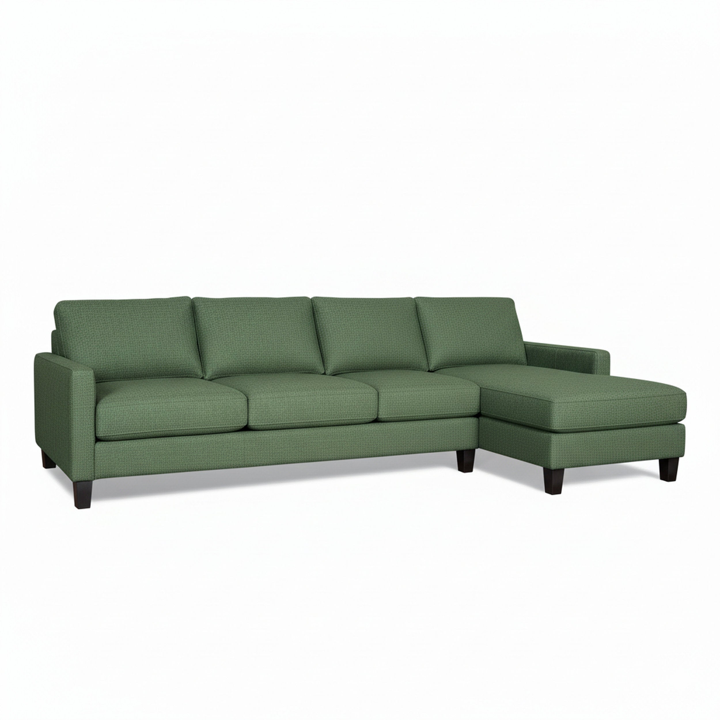 Green sectional sofa on a white background