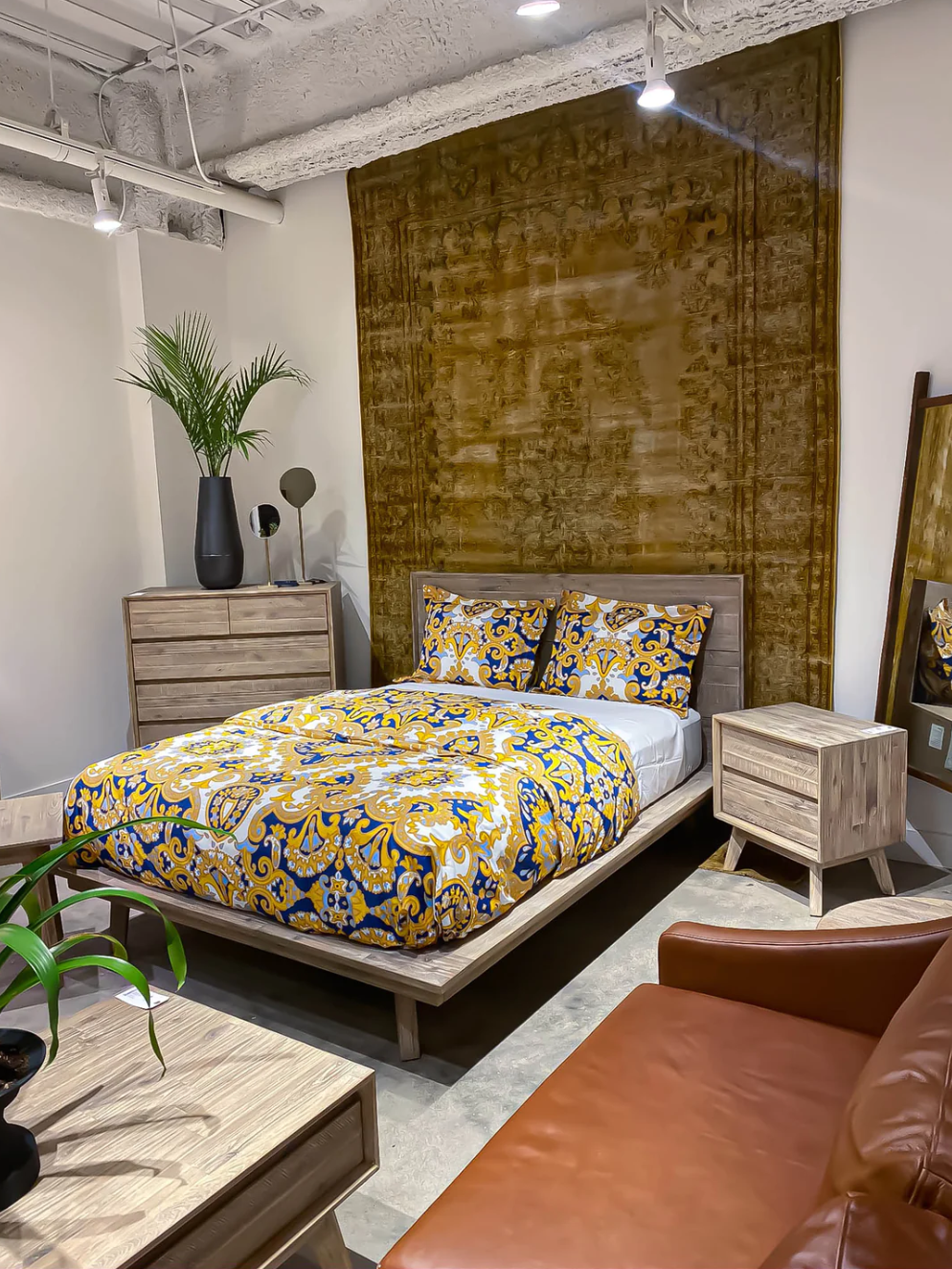 gia bedroom set showing matching nightstand, dresser and bed with bedsheet