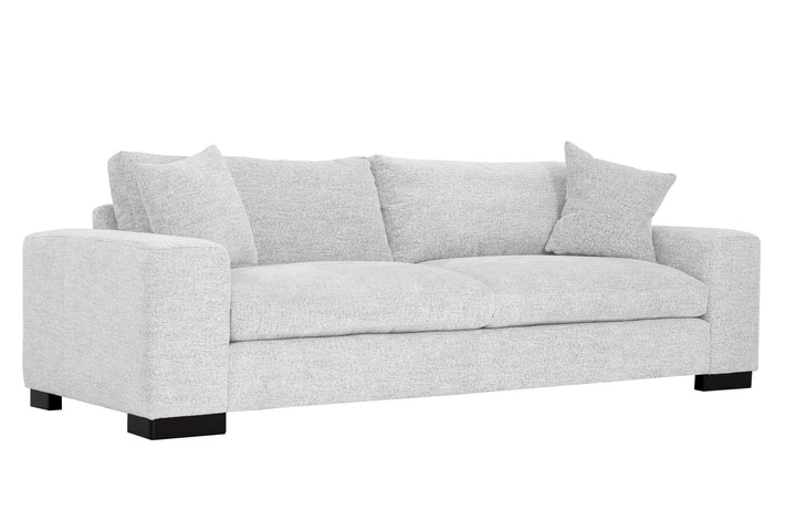 Gray sofa with three cushions on a white background