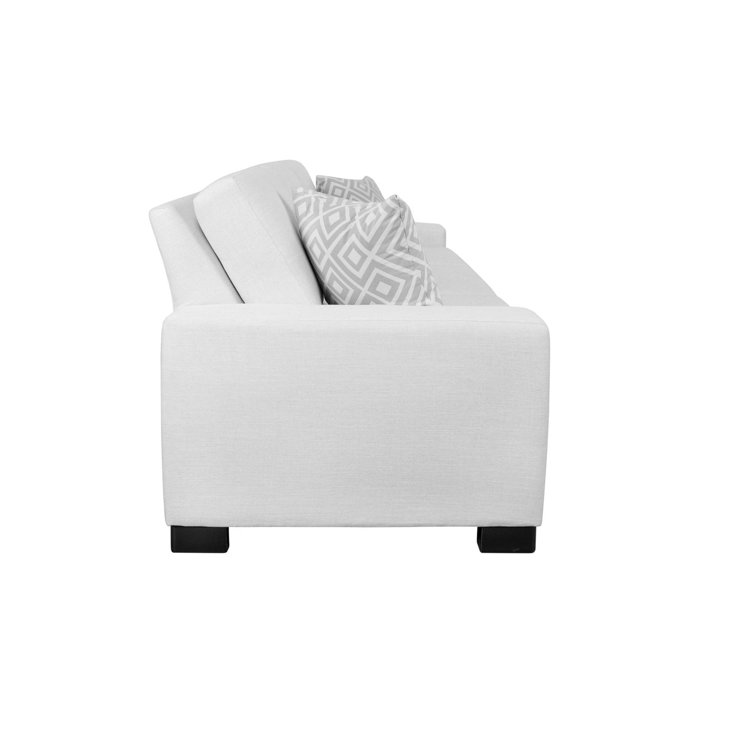 White sofa with a patterned pillow on a white background