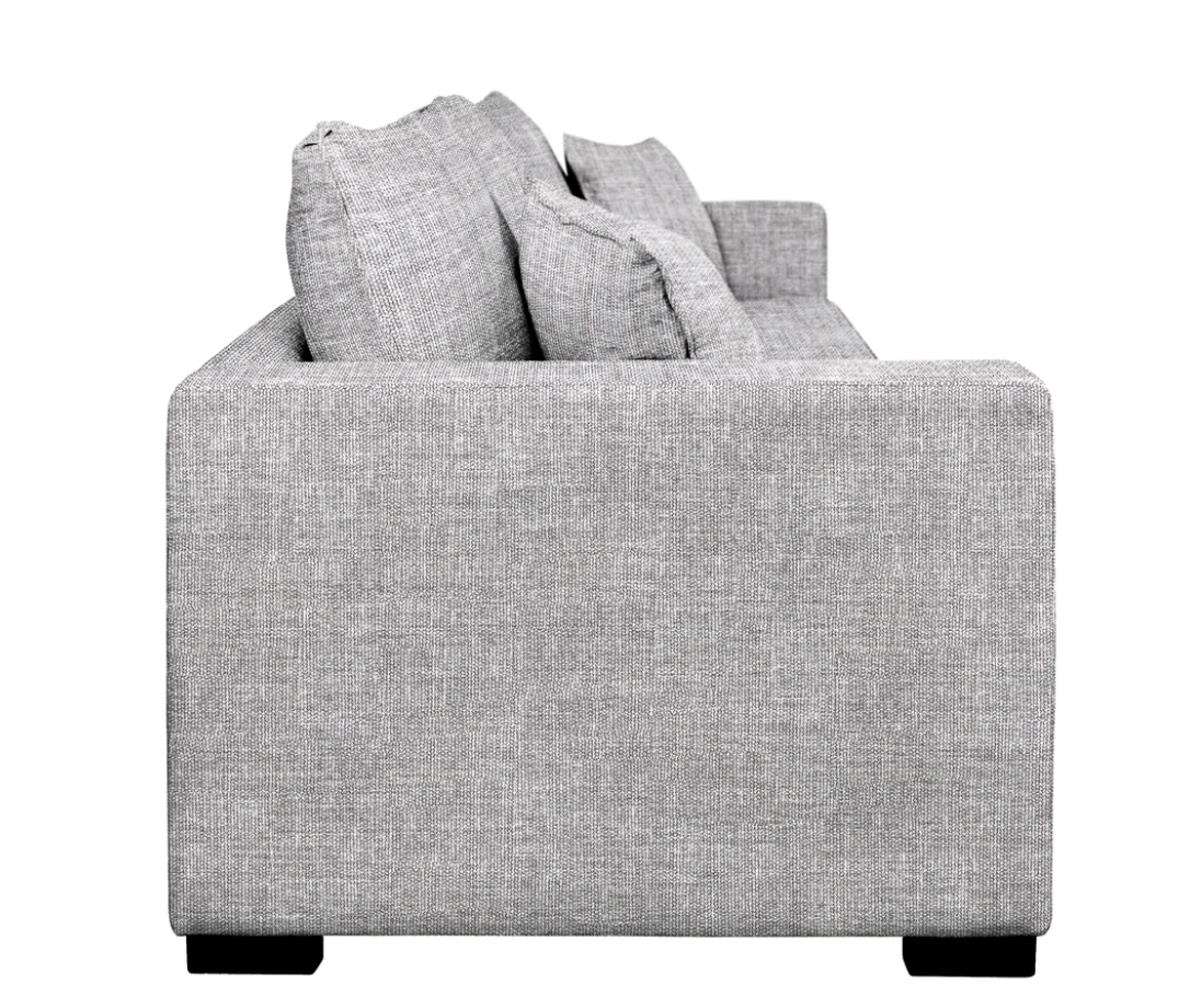 grey sofa showing black legs of the sofa and the square shape of the sofa