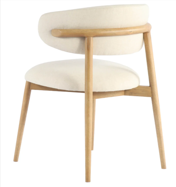 Sideview of An off-white dining chair with a curved backrest and a solid ash wood frame.
