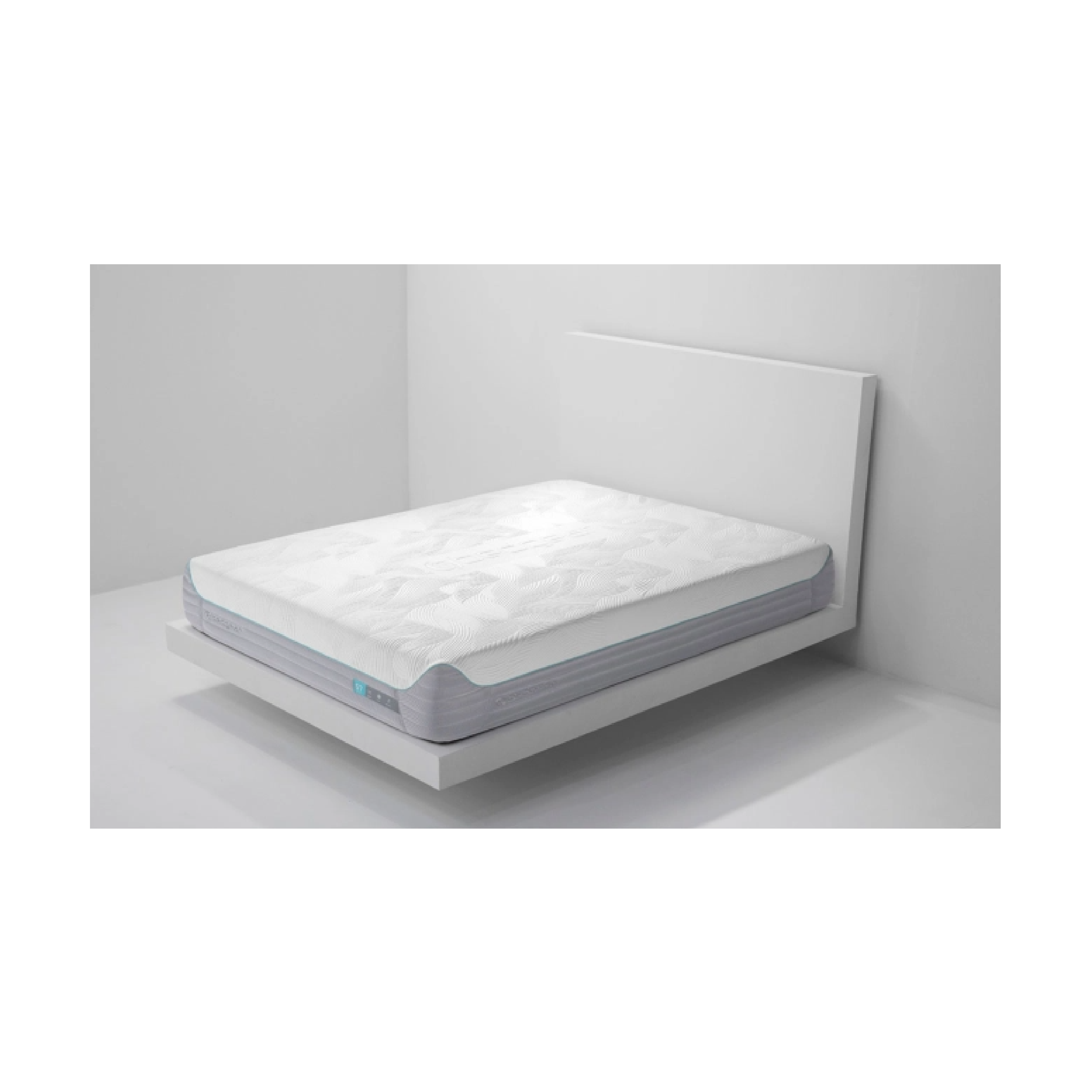A plush memory foam mattress with a white cover, set on a white bed frame in a room with minimalistic white decor.