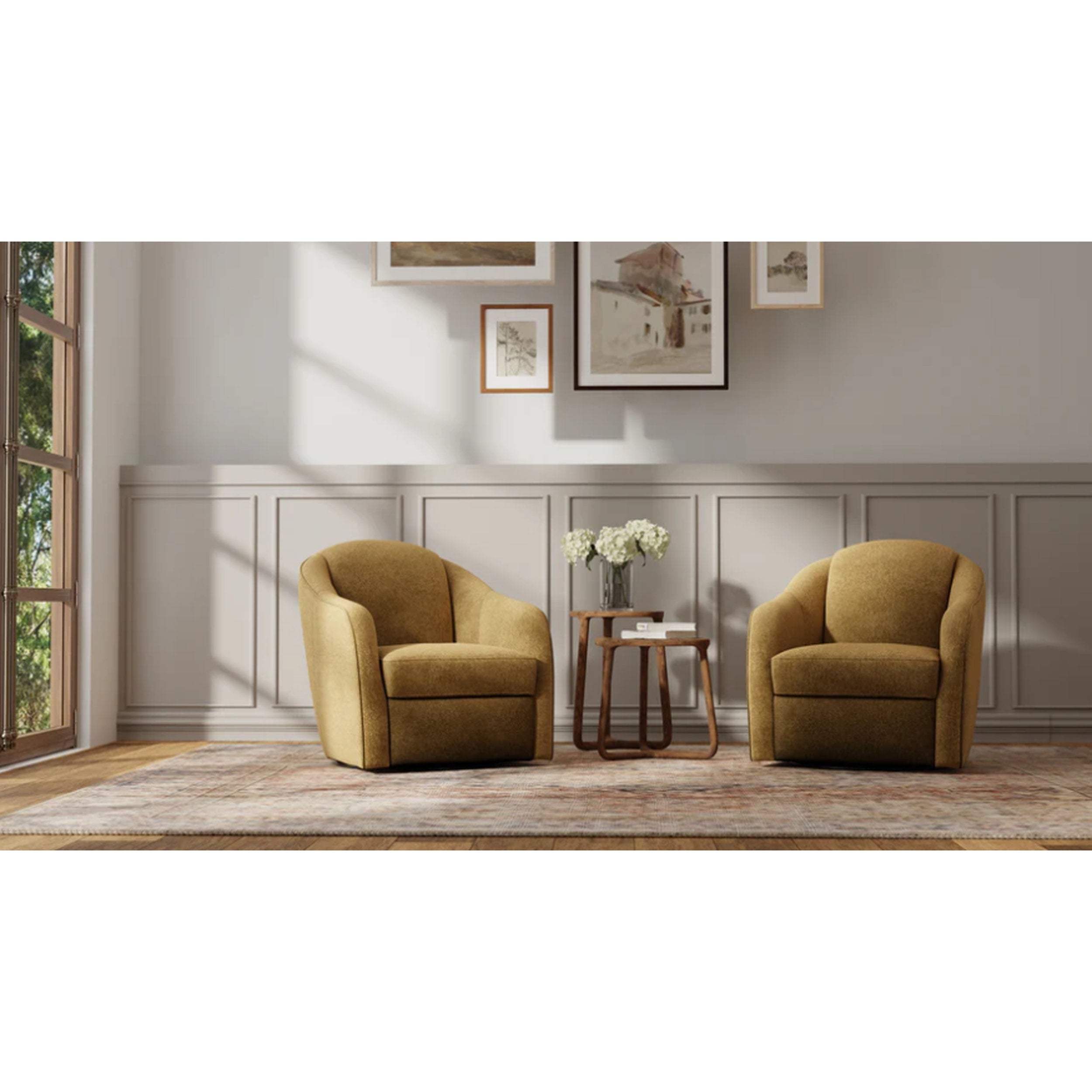 Two mustard-colored armchairs in a living room with a small table and decorative elements.