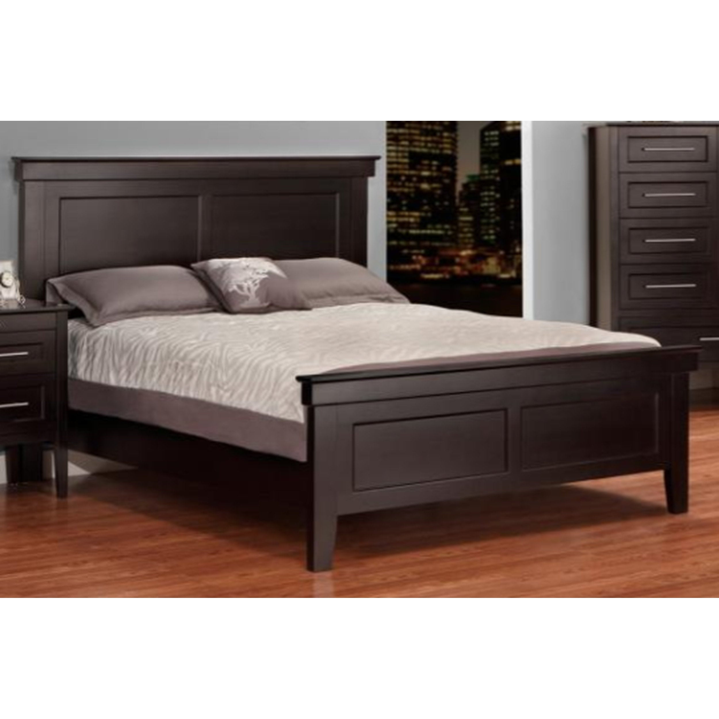 Dark wood bed with gray bedding in a bedroom setting