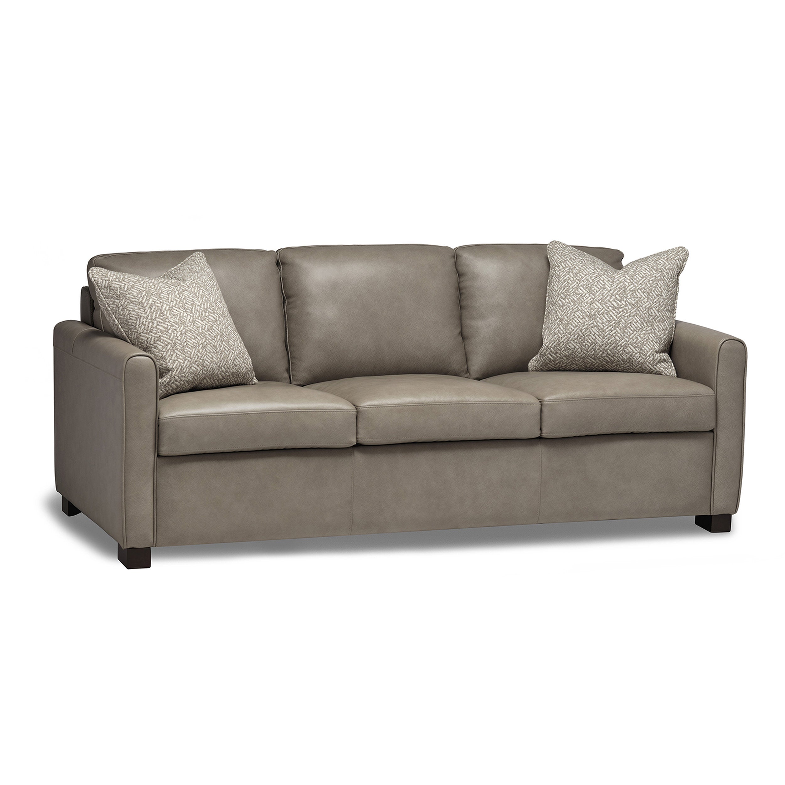 Stylus Weekend Queen Sofa Bed in taupe leatherette with plush cushions and beige geometric throw pillows, modern frame chic