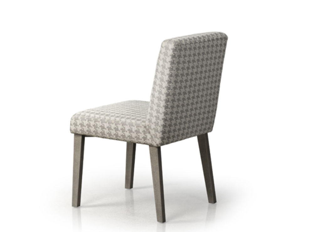 A modern upholstered dining chair with a geometric pattern on the seat and backrest, featuring a metal frame.