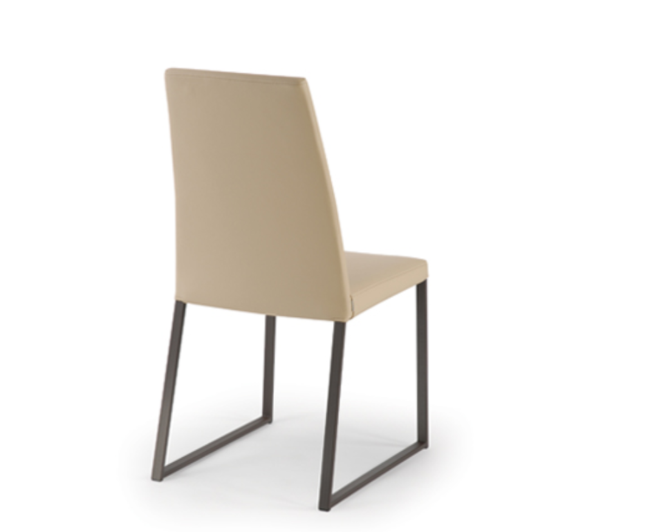 A gray upholstered padded chair with a tubular steel frame and a full backrest.