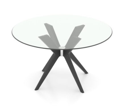 A round glass top table with a matte finish and a modern base with sharp edges. The table is shown in a clear peppercorn washed finish.