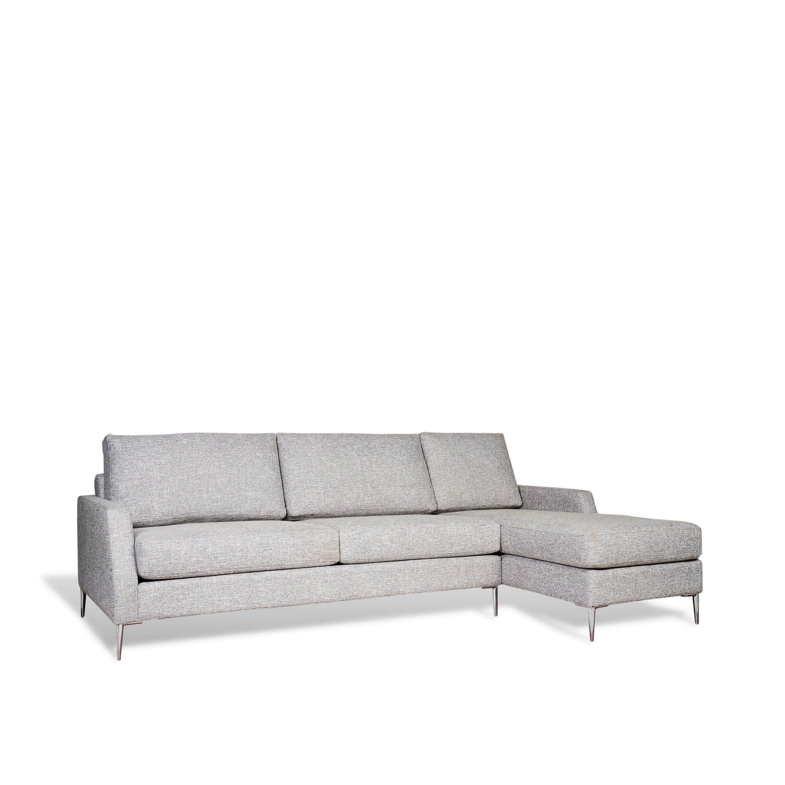 A gray upholstered loveseat with metal legs, part of the Urban Collection.