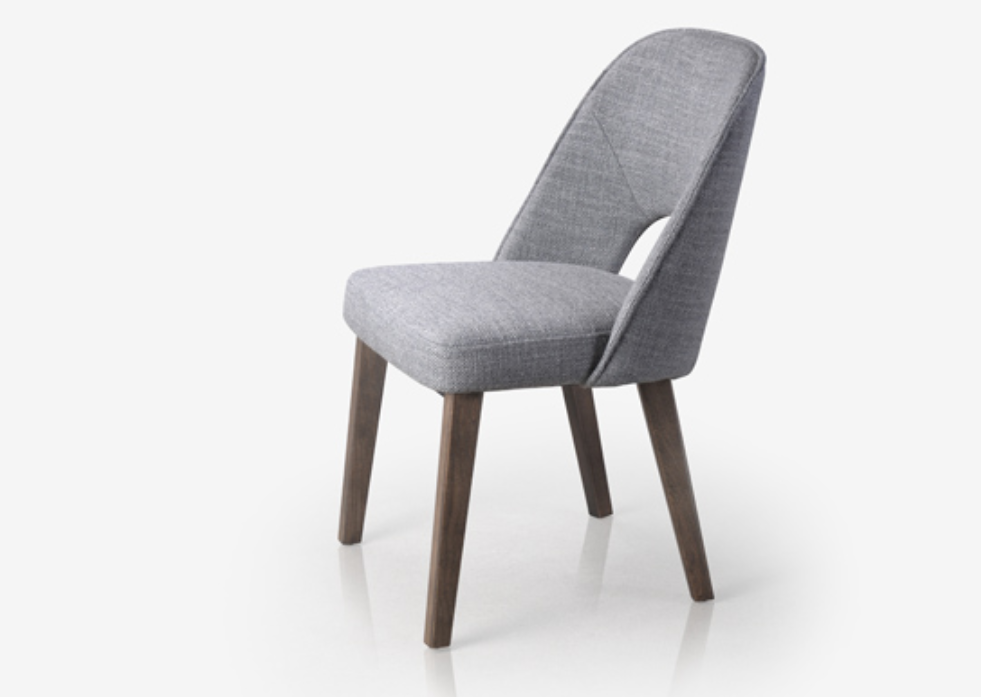 A modern gray upholstered dining chair with a metal frame and solid red oak legs.
