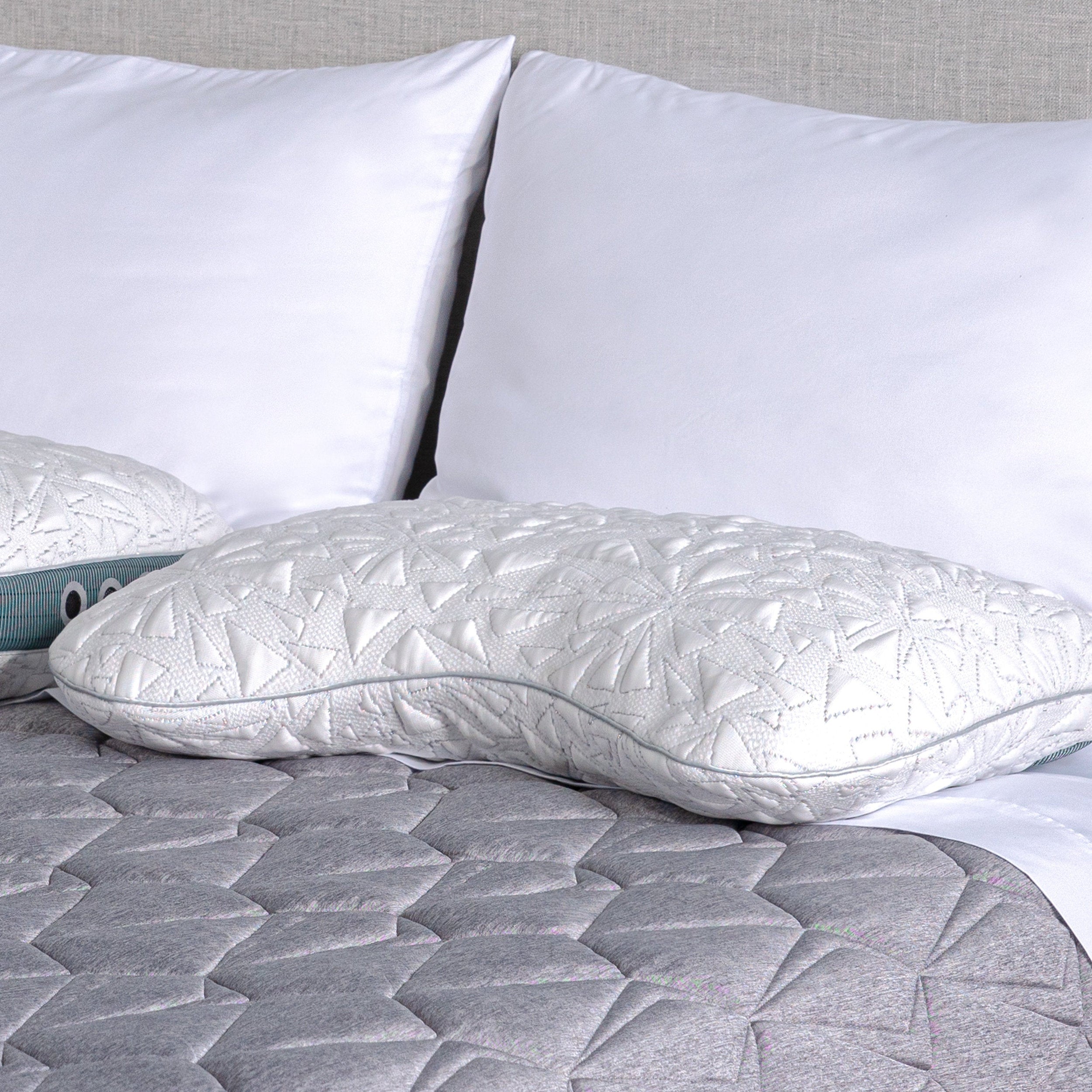 Storm Cuddle Curve Performance® Pillow by Bedgear in white cover with gray piping, plush foam fill, curved silhouette lines.