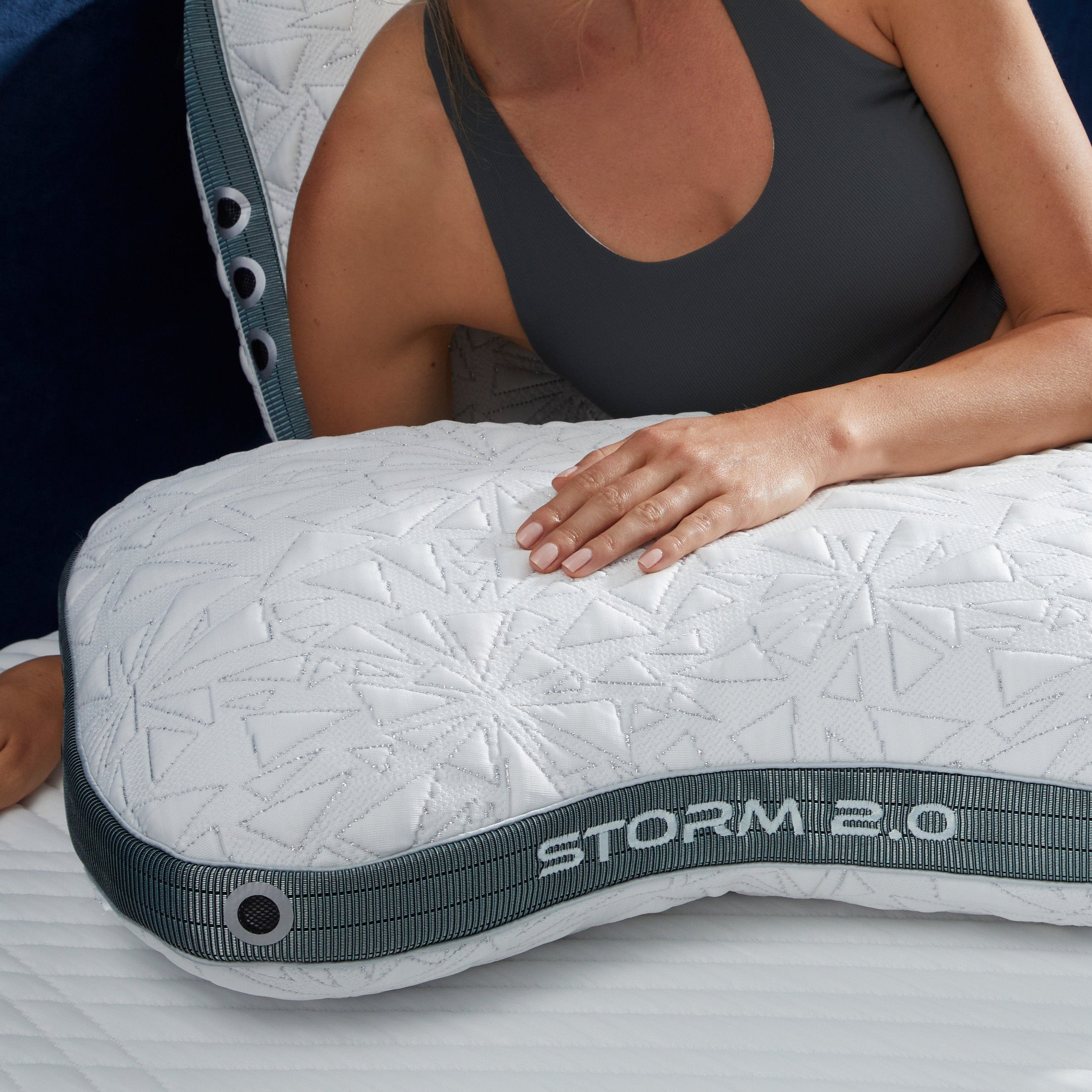 Storm Cuddle Curve Performance® Pillow by Bedgear in white quilted covering with grey piping and dark grey cooling fabric.