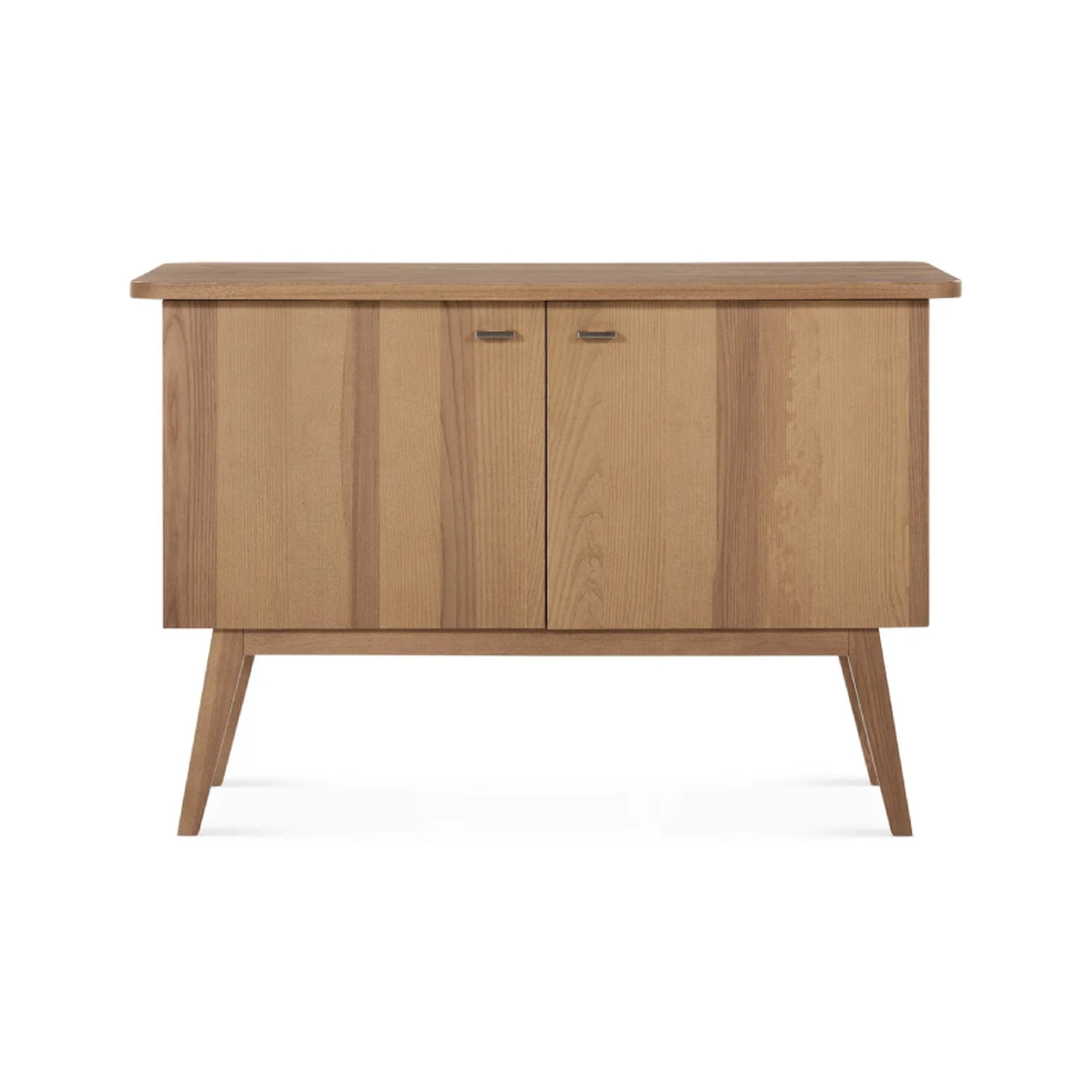 Lena Buffett wooden sideboard in natural oak, warm tones, mid-century legs, brushed metal handles by Verbois natural finish