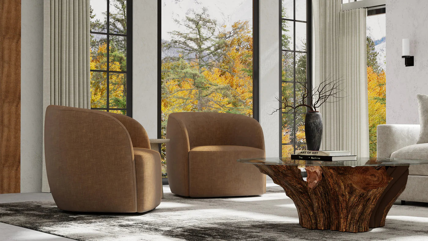 two brown lola swivel chairs in front of a wood coffee table in a living room setting 