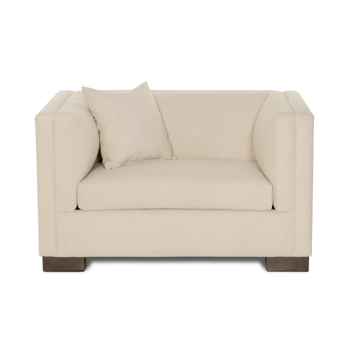 Beige armchair with a pillow on a white background