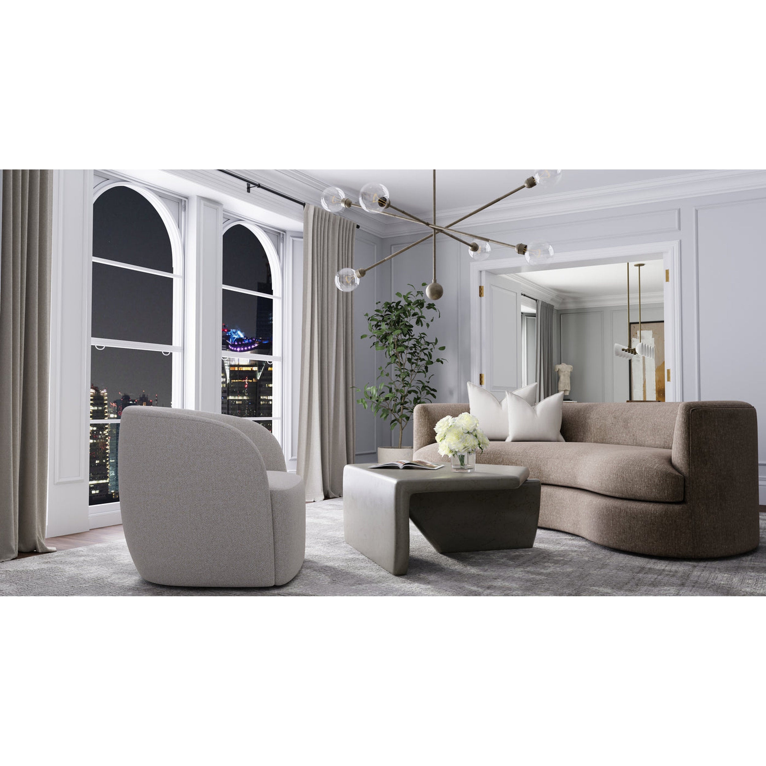 Modern living room with gray sofa, armchair, and coffee table.