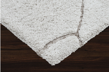 Load image into Gallery viewer, close up of the pattern of the allen area rug
