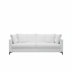 White sofa with cushions on a white background