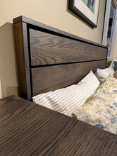 Load image into Gallery viewer, dark Wooden headboard with bedding and pillows in a bedroom setting
