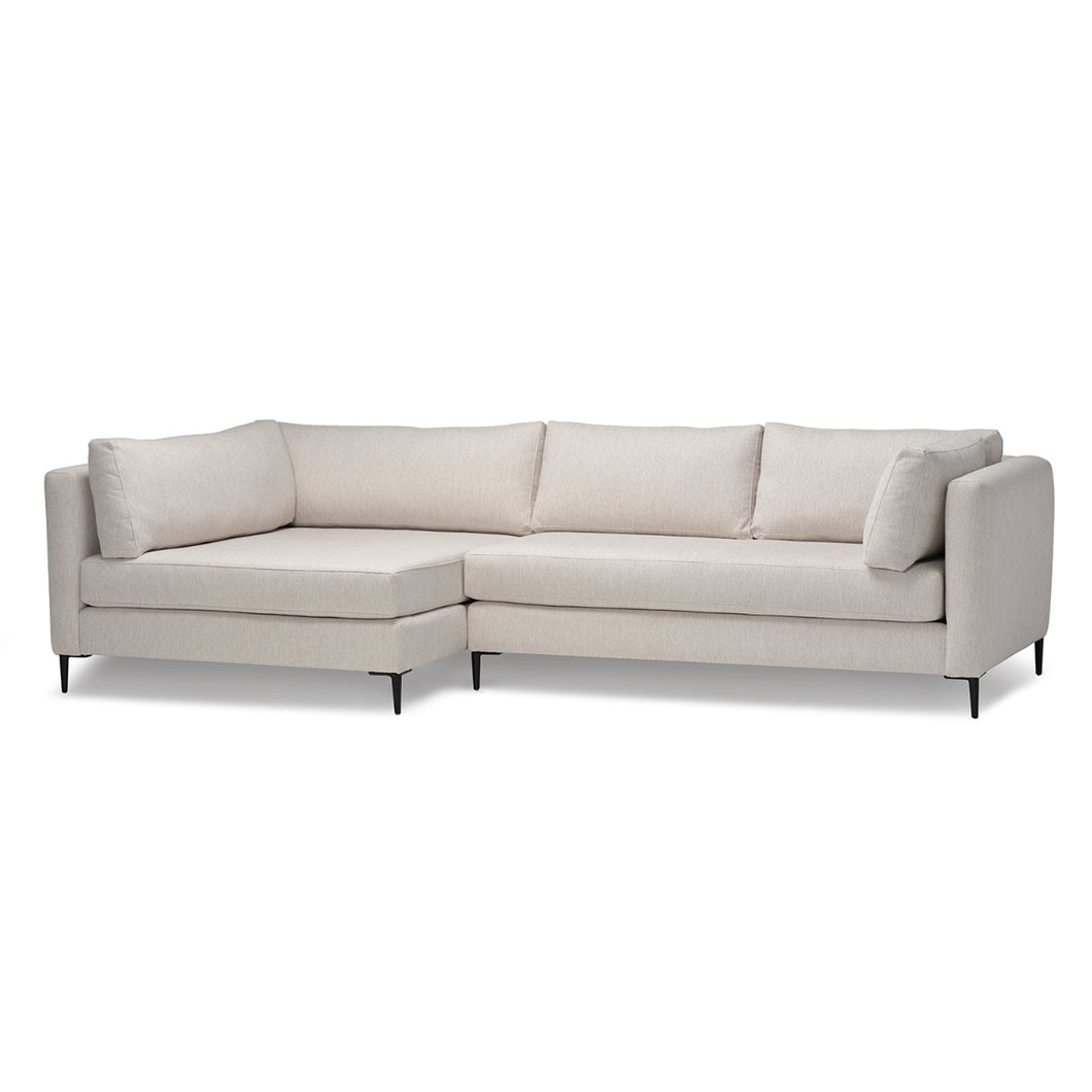 Beige sectional sofa on a white background
