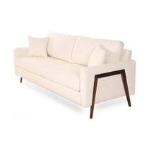 Load image into Gallery viewer, Beige sofa with wooden legs on a white background
