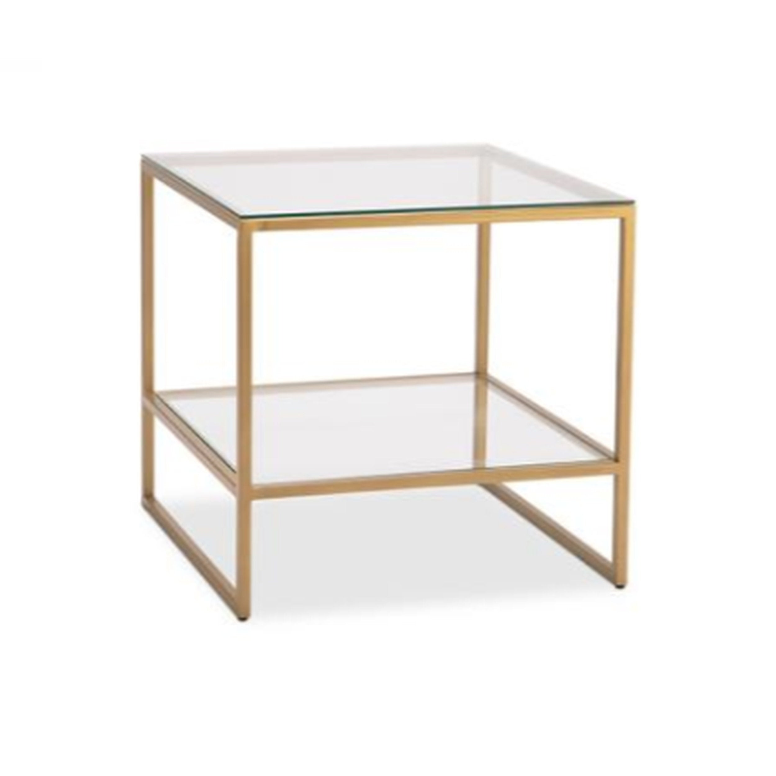 Glass side table with gold frame on a white background
