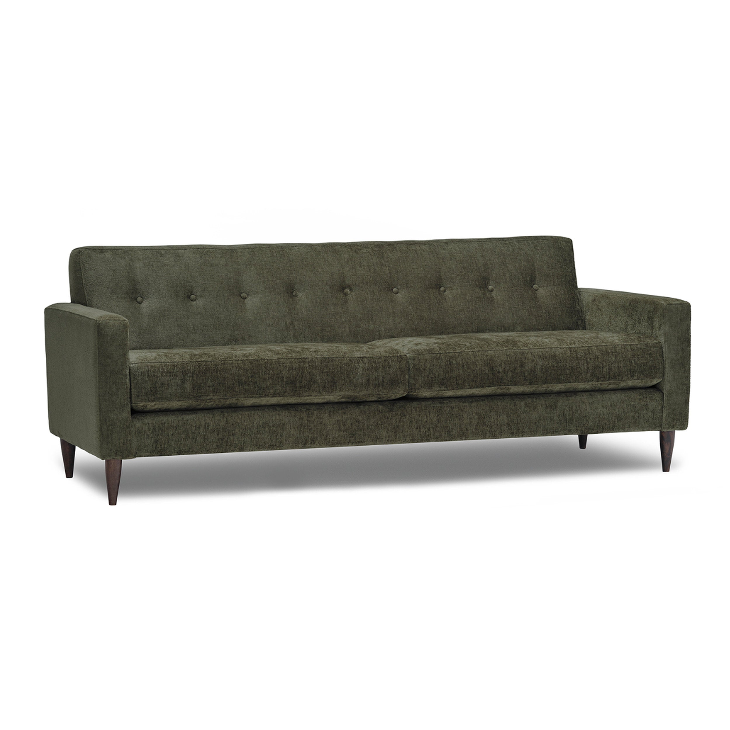 Green sofa with buttoned backrest on a white background