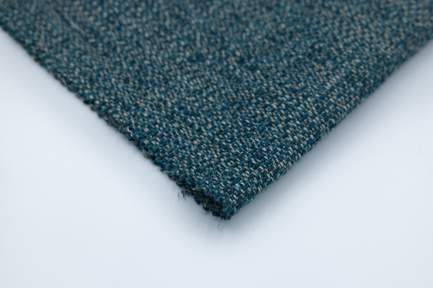 Zen Turquoise textile swatch in teal-blue and gray woven threads, rich turquoise hues, denim-like texture, Van Gogh Designs