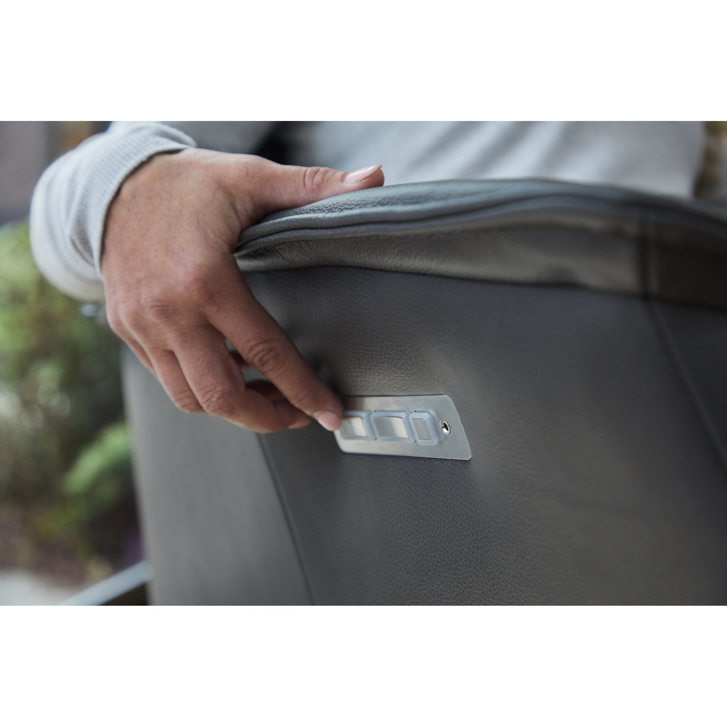 the bo recliner control showing the man controlling it 