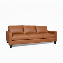 Load image into Gallery viewer, Brown leather sofa on a white background
