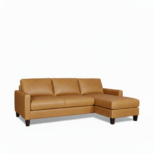 Brown leather sectional sofa on a white background