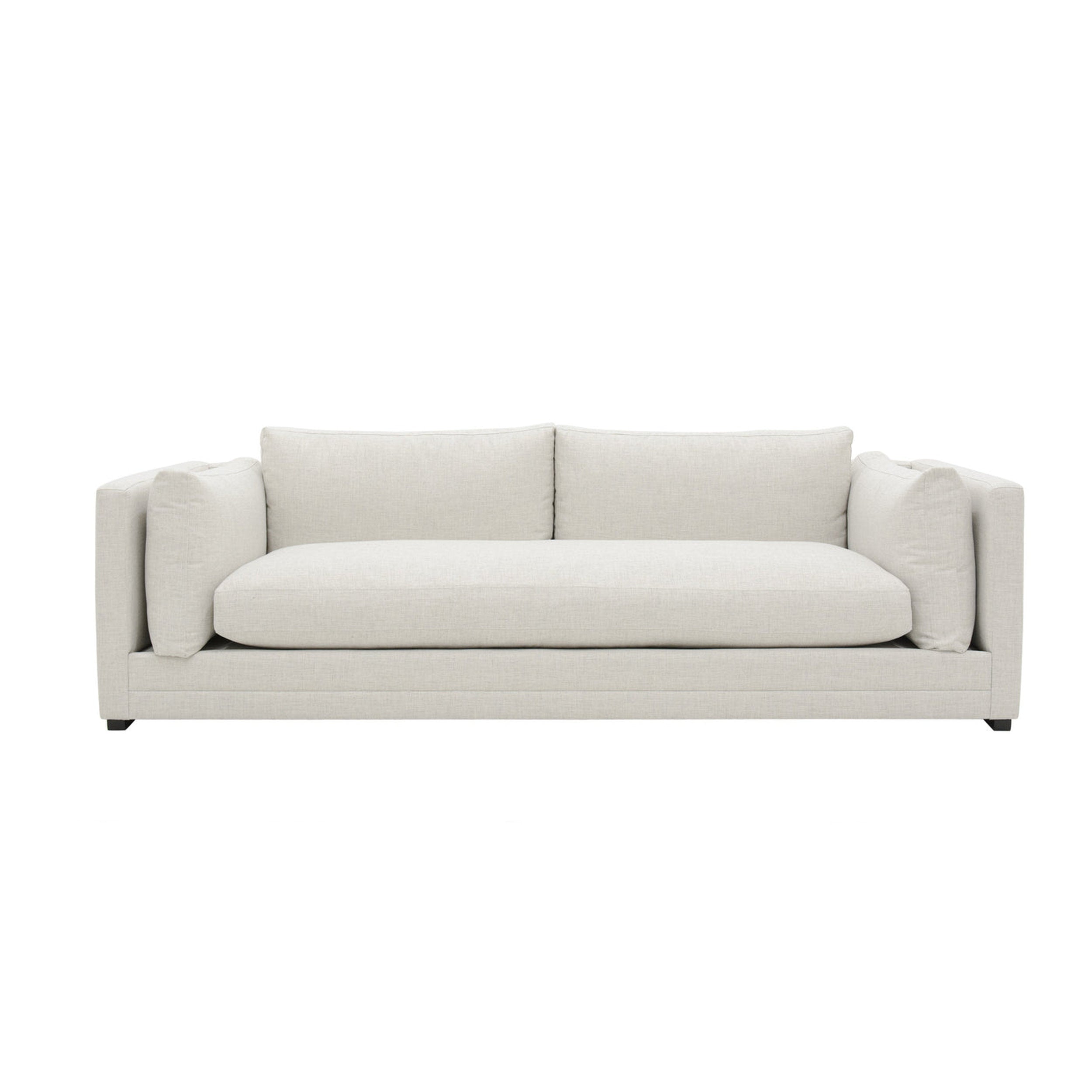 Beige sofa on a white background