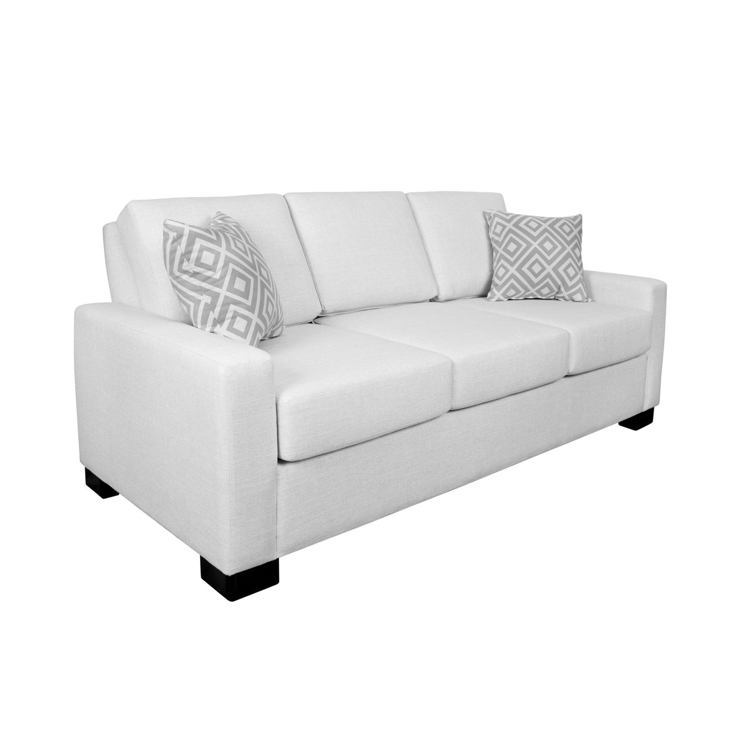 White sofa with patterned cushions on a white background