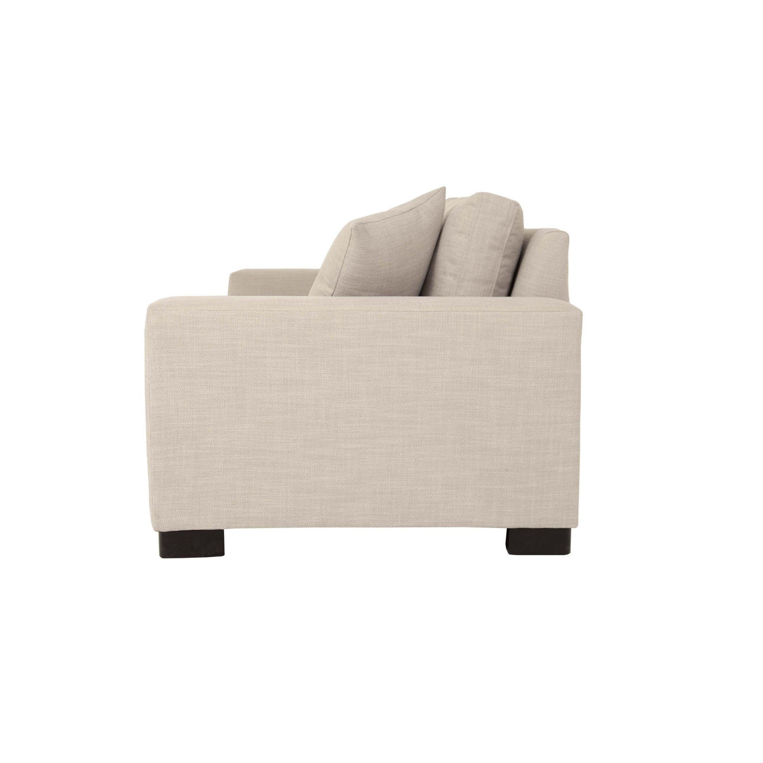 Beige armchair with two cushions on a white background