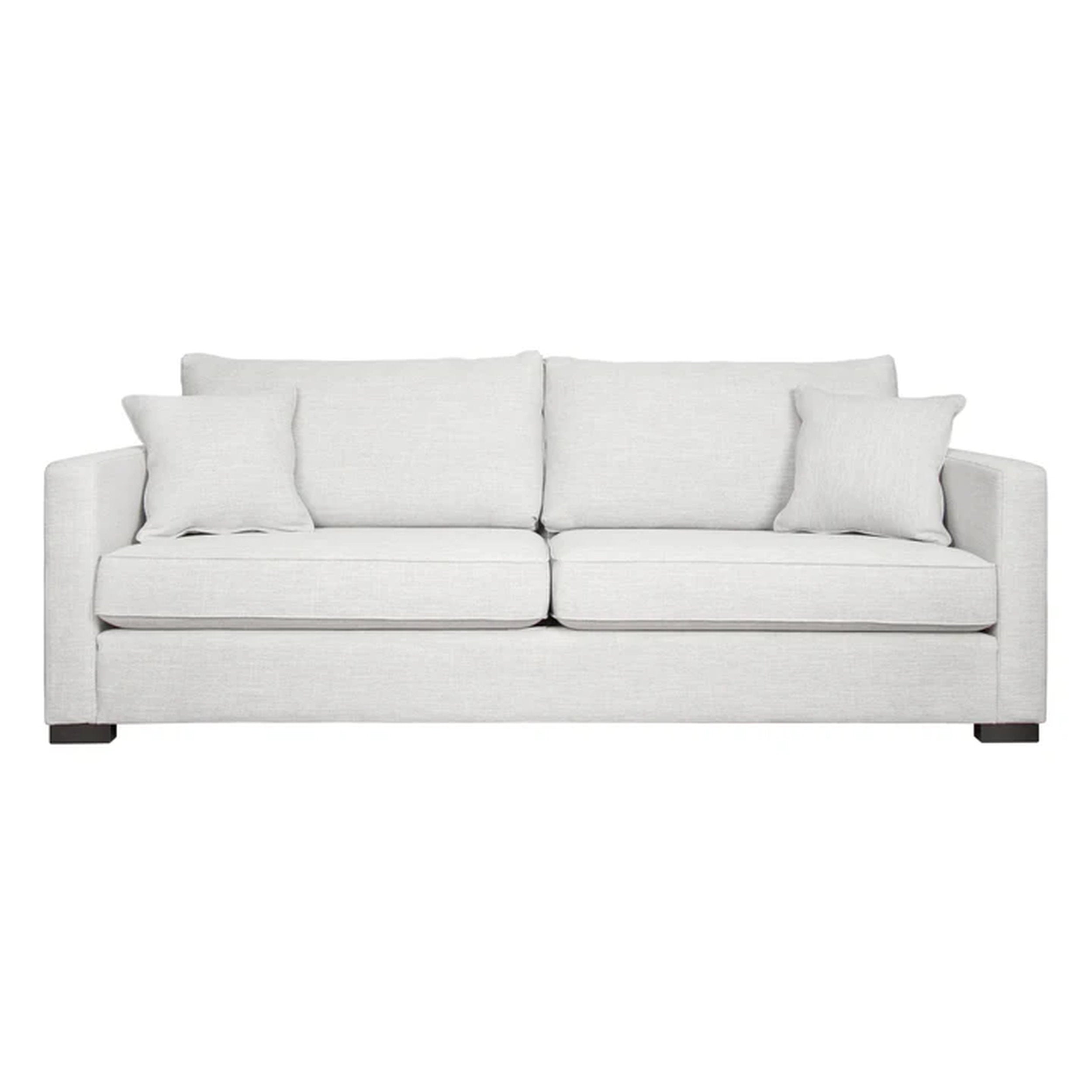 White Kane sofa with cushions on a white background