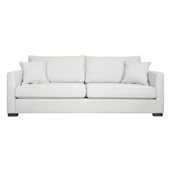 White Kane sofa with cushions on a white background