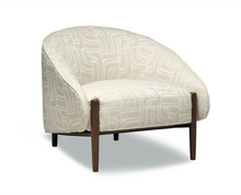 Load image into Gallery viewer, Patterned armchair with wooden legs on a white background
