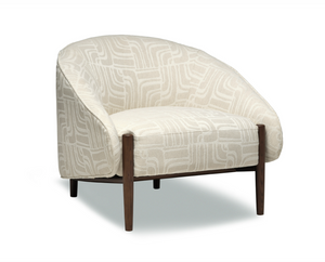 Patterned armchair with wooden legs on a white background