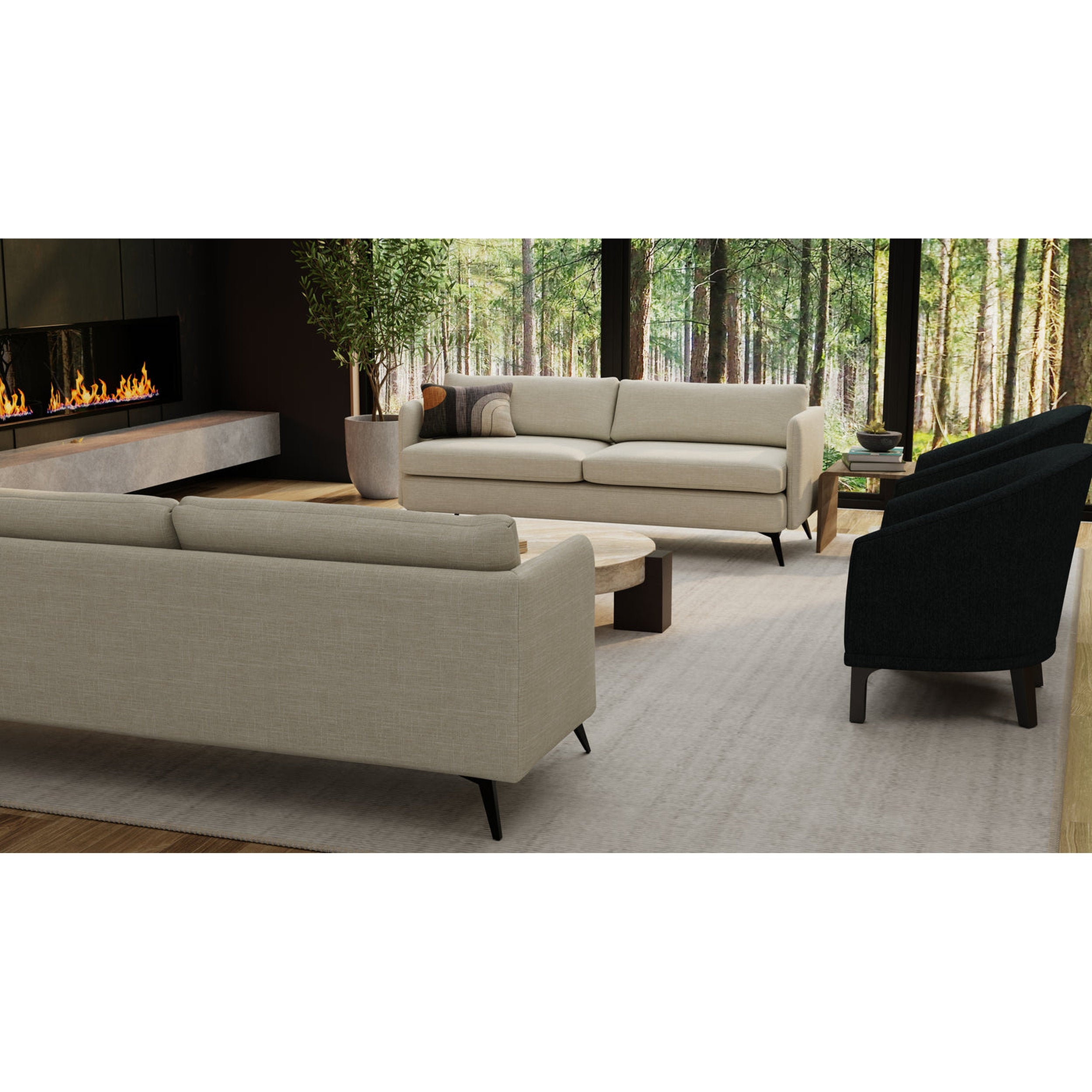 Modern living room with beige sofa, black armchair, and fireplace with forest view.