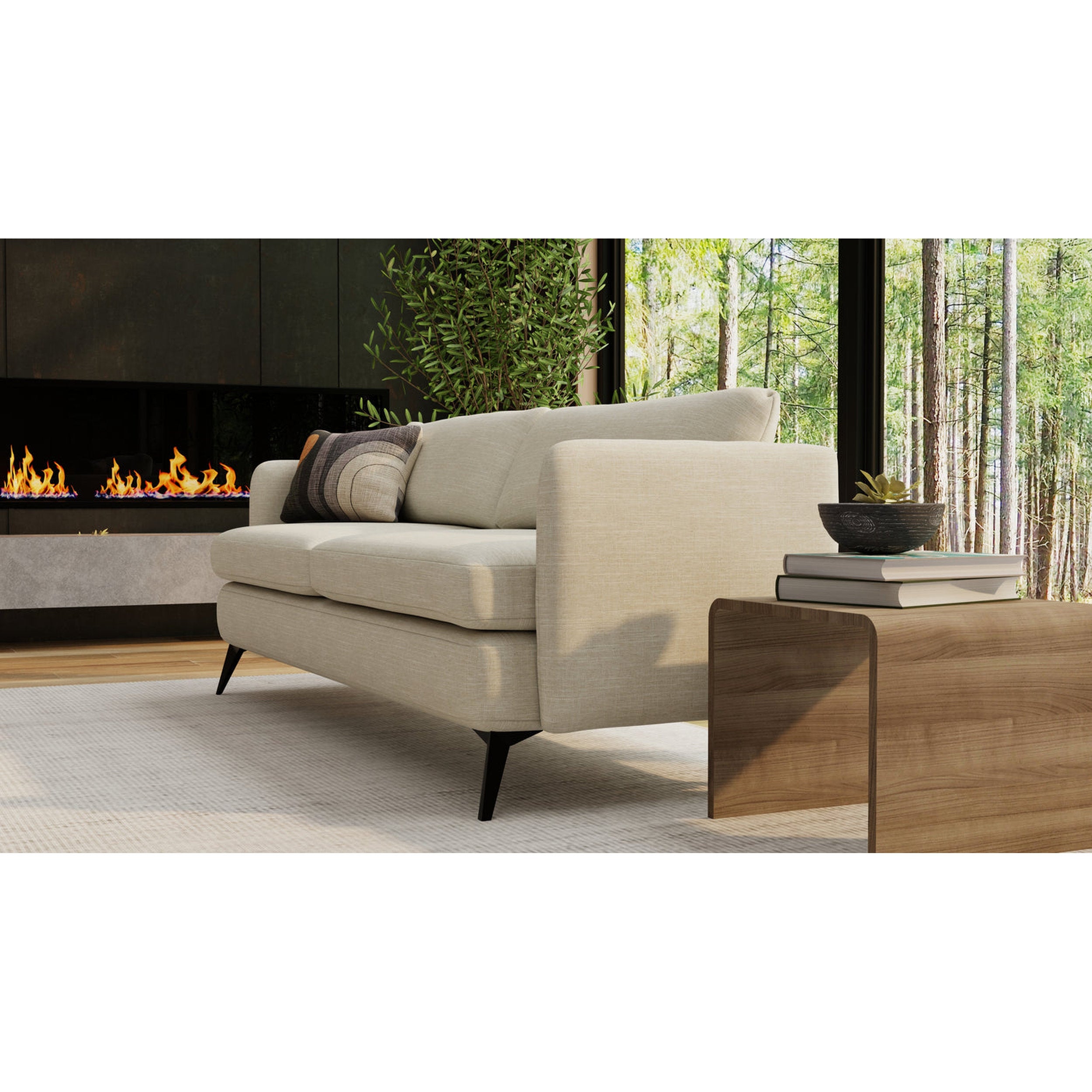 Beige sectional sofa in a living room with a fireplace and window view of trees.