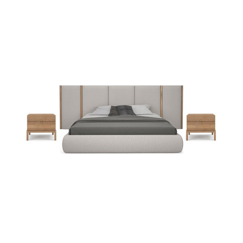 Modern bedroom set with bed, headboard, and nightstands on a white background