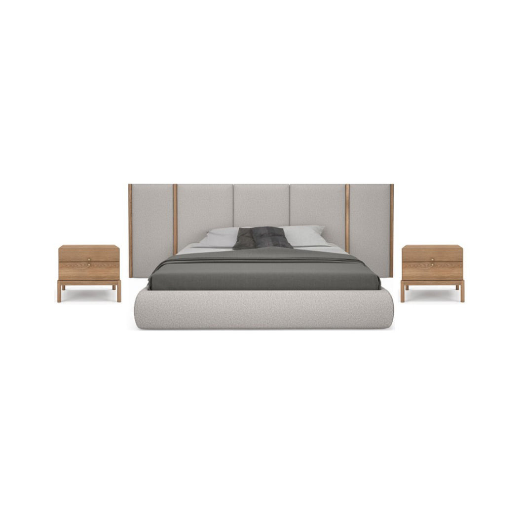 Modern bedroom set with bed, headboard, and nightstands on a white background